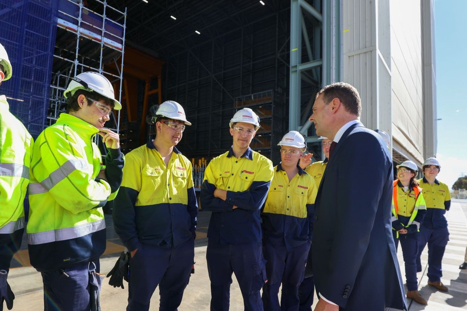 Minister for Defence and Space Industries, Stephen Mullighan with apprentices from Findon Technical College